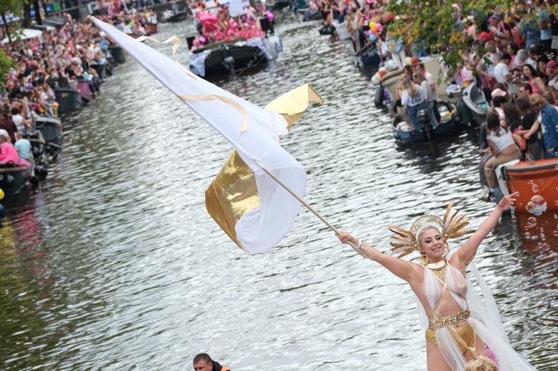 Revelers participate in the Annual Pride Canal Parade held in Amsterdam. Pride Amsterdam celebrates the city's gay and transgender community with a vibrant boat parade through the canals, The Netherlands, on 2 August 2025.