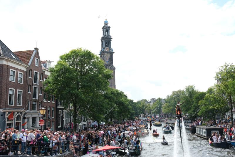 Revelers participate in the Annual Pride Canal Parade held in Amsterdam. Pride Amsterdam celebrates the city's gay and transgender community with a vibrant boat parade through the canals, The Netherlands, on 2 August 2025.