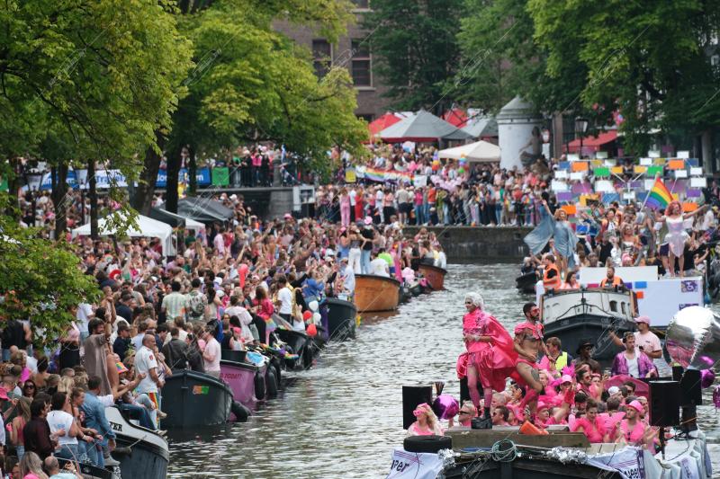 Revelers participate in the Annual Pride Canal Parade held in Amsterdam. Pride Amsterdam celebrates the city's gay and transgender community with a vibrant boat parade through the canals, The Netherlands, on 2 August 2025.