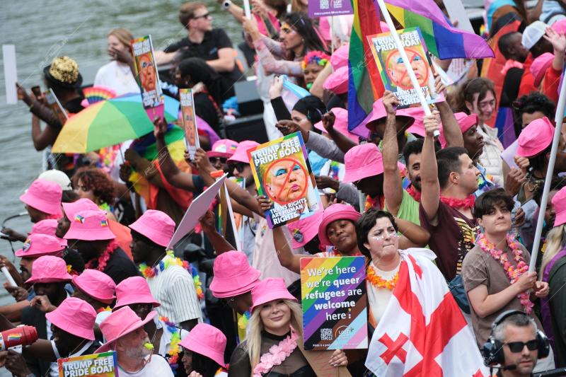 Revelers participate in the Annual Pride Canal Parade held in Amsterdam. Pride Amsterdam celebrates the city's gay and transgender community with a vibrant boat parade through the canals, The Netherlands, on 2 August 2025.